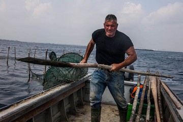 Storie anfibie di uomini della Laguna